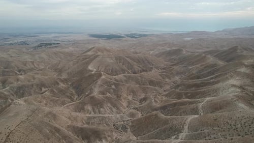 Aerial video over the beautiful desert landscapes of the Dead Sea Israel