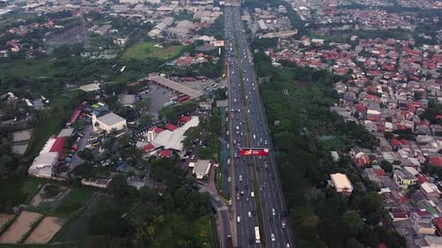 aerial drone shot, highway traffic timelapse during the day.