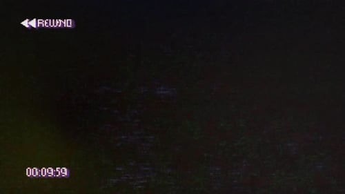 Retro VHS Rewind Interface with Decreasing Timecode and Static Effect