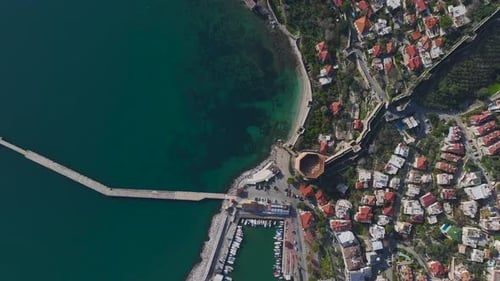 Aerial Video of a Coastal City Panorama With a Breathtaking View of the Azure Sea and a Clear Blue