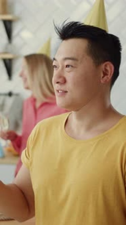 Smiling Man Celebrates Birthday With Champagne