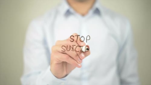 Hand Writing Stop Suicide Message