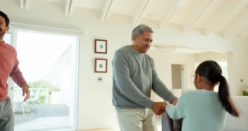 Happy Family Dances Together in Brightly Lit Home