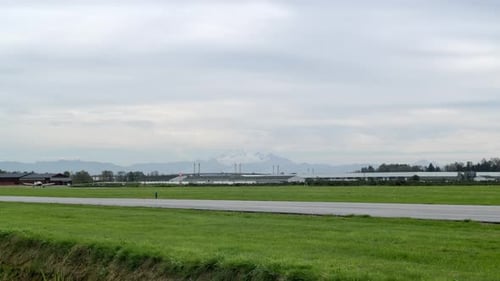 Slow Motion Shot Small Propeller Airplane Taking Off from the Runway