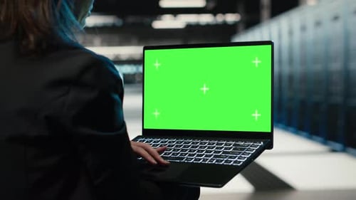 Green Screen Laptop Used By Data Center Programmer to Troubleshoot Issues