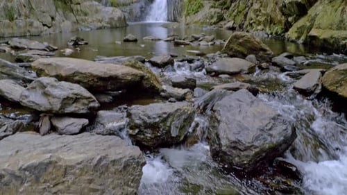 Waterfall Flowing Into Rocky Stream - Freshwater Creek With Crystal Cascades In The Background. - wi