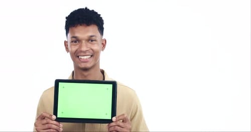 Face, man or green screen tablet in studio with mockup space, promotion information
