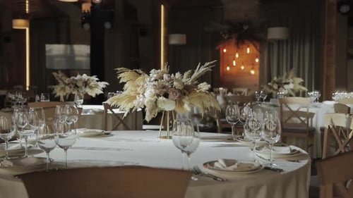 A Beautifully Decorated Restaurant Awaits a Romantic Wedding Reception