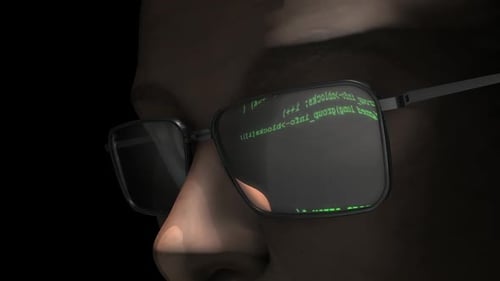 Gros plan des lunettes reflétant le Code