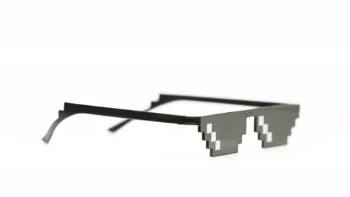 Pixelated Sunglasses Rotating on a White Background