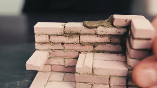 Miniature Brick House Construction with Trowel Tiny Brickwork and Cement Wall
