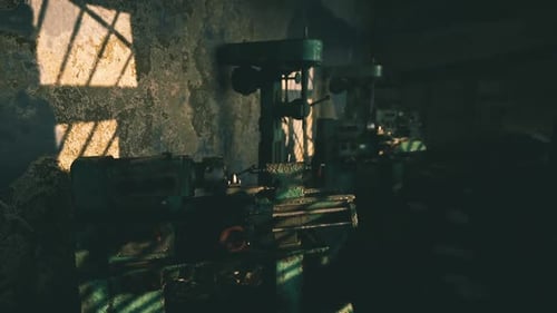 Abandoned Workshop with Machinery Illuminated By Fading Light at Dusk