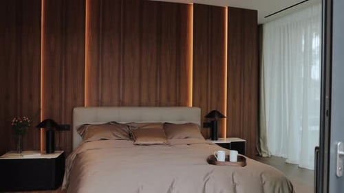 Modern Bedroom Interior With Elegant Bedding and Wood Panels