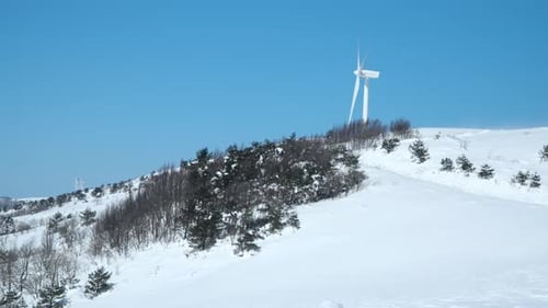 Giant wind turbine in a winter landscape