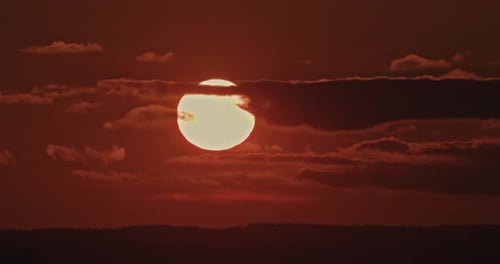 Fiery Sunset Time Lapse with Passing Clouds
