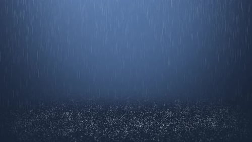 Heavy torrential rain hits ground.Rain falling background with water splash.