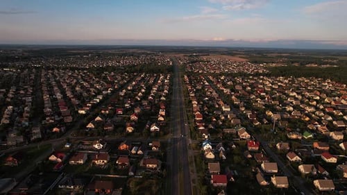 Aerial View of a Lake with People Relaxing on Theon the White Sand Beach and Driveway with Parking