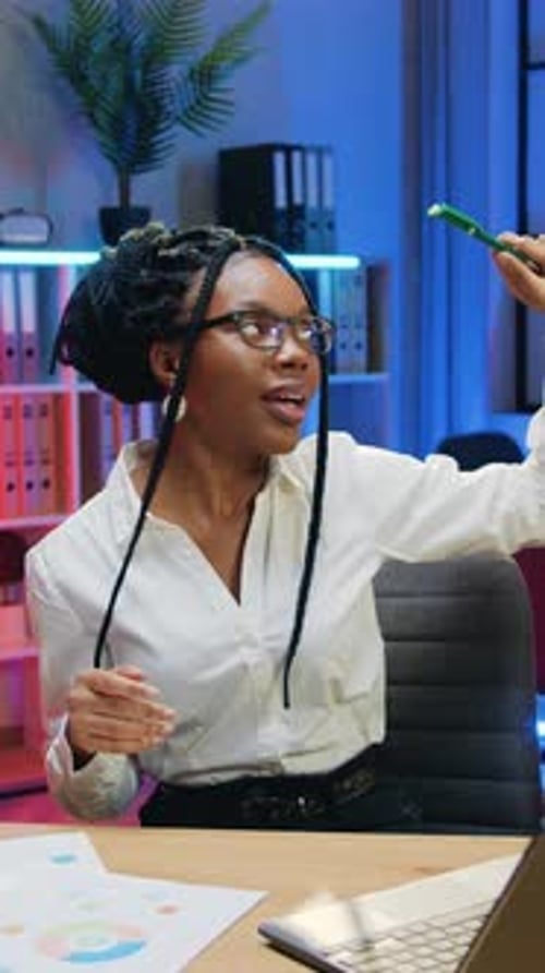 Beautiful Woman Blogger Broadcasting Stream on Video Camera and Explaining Indicators of Export and