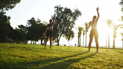 Morning Workout Outdoors Athletic Women Doing Yoga Exercise in Garden in Summer Slender Ladies in