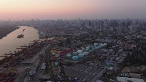 Aerial view of a bustling container port showing maritime logistics in action