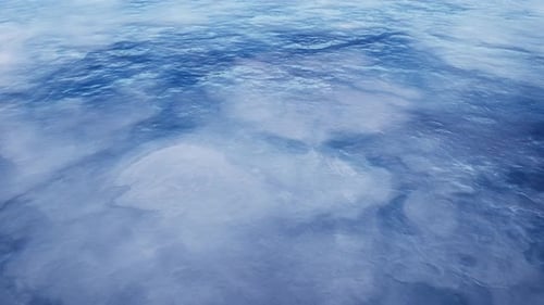 Ice And Water Create Abstract Patterns Near The Arctic Circle