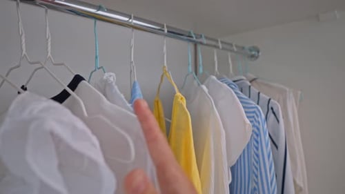 Shirts Hanging in a Wardrobe Closet