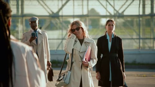 Enthusiastic Businesswoman Welcoming Her Team in City