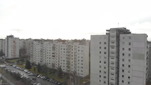 Big old neighbourhood panoramic view of Chernobyl style flats with a scenic horizon background