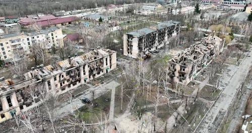 Drone Flying Over a Destroyed District