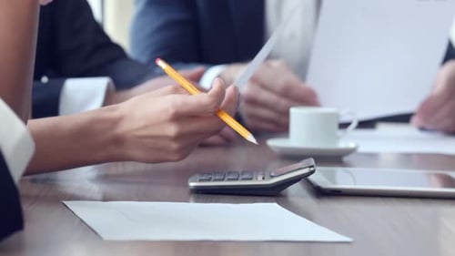 Team Analyzing Data at Corporate Meeting