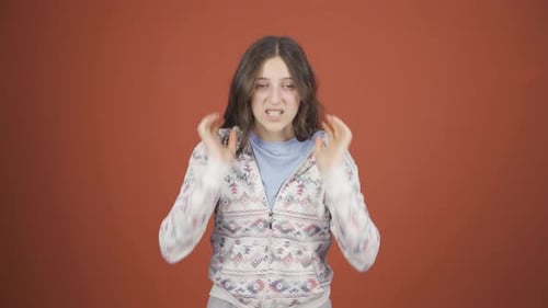 Distressed Woman with Hands on Head Indoors