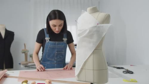 Fashion Designer Working in Bright, Clean Studio