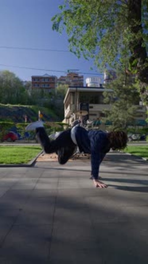 Vertical Video Stylish Male Street Dancer Dancing Hip Hop on Urban Background