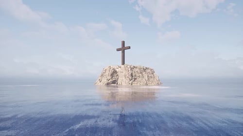 A large wooden cross standing upon a large cliff in the middle of the sea, with seagulls flying abov
