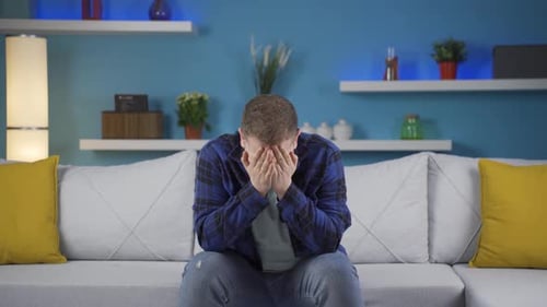 Sad man is crying.