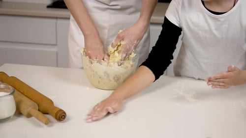 Boy and Girl Learn Kneading Dough with Hands Close Up Cute Funny Children Having Fun Help Happy