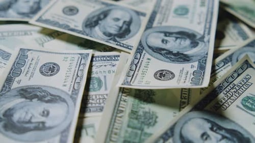 Pile of United States One Hundred Dollar Bills