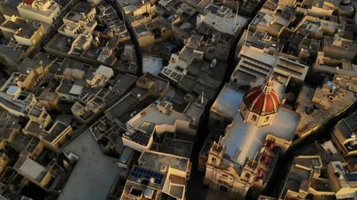Aerial overhead shot of the beautiful St. George Basilica on a warm day in Victoria, Gozo, Malta