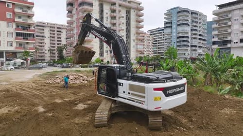 Aerial View Construction Site Start First Concrete and Machinery at Work