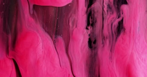 Viscous Pink Paint Swirling Abstractly