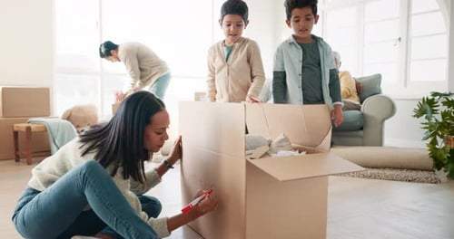 Happy, children helping parents with packing, boxes and packaging together in a house