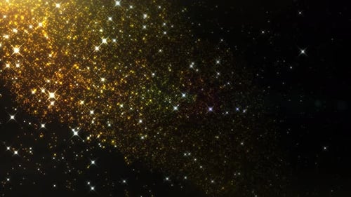 Sparkling shining glowing gold particles.