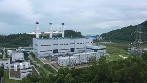 erial view of chimneys of power plant, an industrial district. Modern large thermal power plant