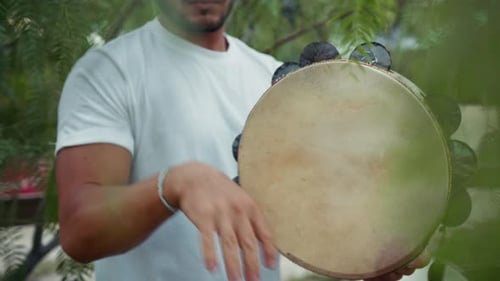 Tambourine Vibrations Echoing in Rolling Hills