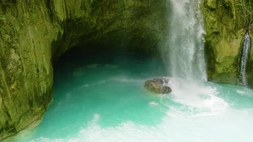 Waterfall in the Tropical Mountain Jungle
