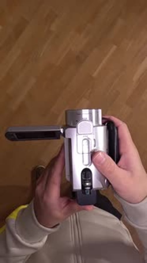 Vertical Video Pov Videographer Holding an Old Vintage Camcorder Handycam