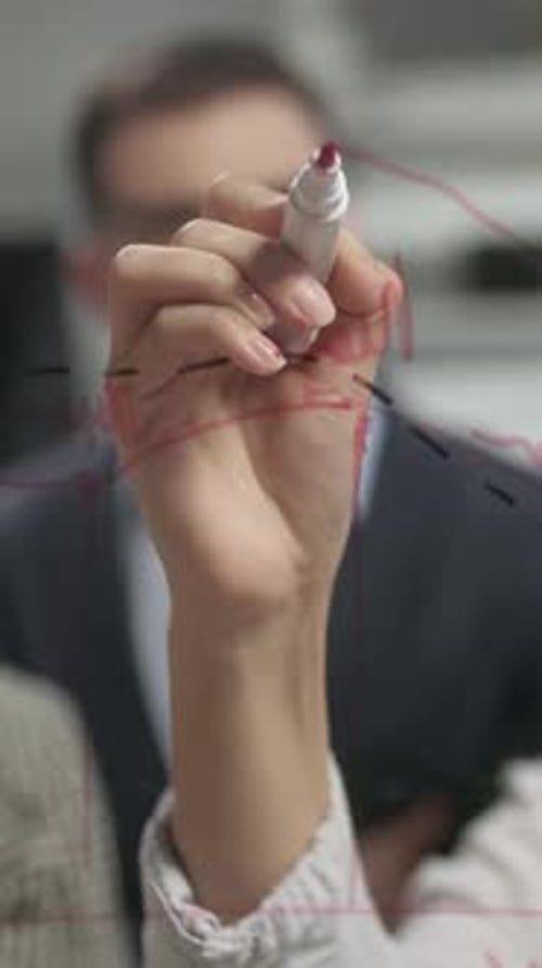 Team Discussing Plans in Modern Workplace