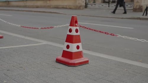 Renovation Protective Tape Traffic Cone on the Sidewalk
