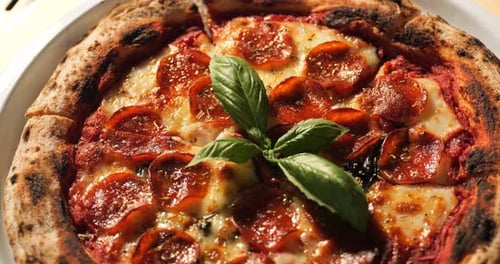 Close-Up of Delicious Pepperoni Pizza with Basil