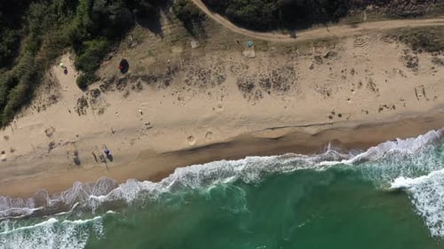 Aerial View of Remote Sandy Beach and Sea Waves by Drone